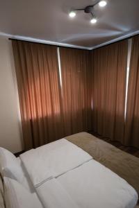 Postel nebo postele na pokoji v ubytování Prime Hotel