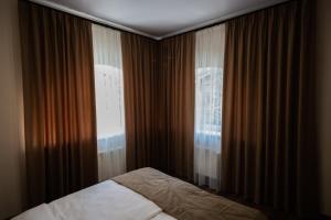 Postel nebo postele na pokoji v ubytování Prime Hotel