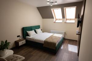 Postel nebo postele na pokoji v ubytování Prime Hotel
