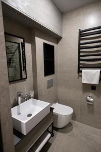 Koupelna v ubytování Prime Hotel