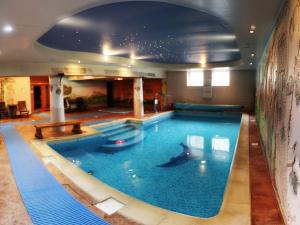 Bazén v ubytovaní Hotel Monet & Rubbens alebo v jeho blízkosti