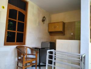 Kuchyň nebo kuchyňský kout v ubytování Kaia Lovina Guest House