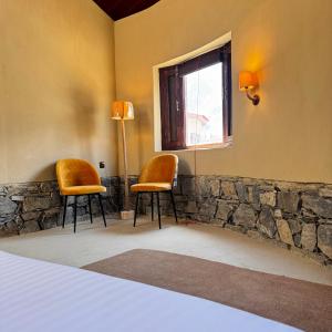 Ένα ή περισσότερα κρεβάτια σε δωμάτιο στο Sukoon Resorts