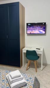 TV a/nebo společenská místnost v ubytování Casa Procida