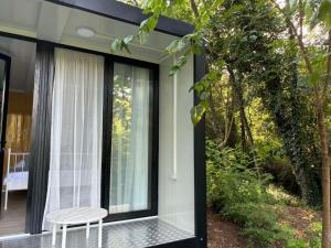 Zahrada ubytování Frutak Resort-TINY HOMES + 14 fotografií