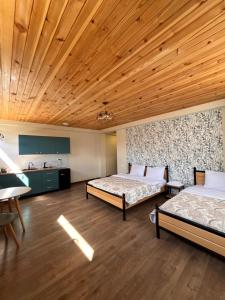 Postel nebo postele na pokoji v ubytování Apart-Hotel Seti