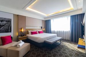 Letto o letti in una camera di Wyndham Acmar Klang