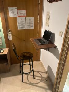 TV a/nebo společenská místnost v ubytování Hostal El Olivo