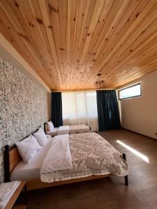 Postel nebo postele na pokoji v ubytování Apart-Hotel Seti
