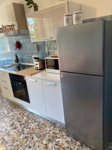 A kitchen or kitchenette at Attico San Francesco