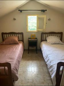 Postel nebo postele na pokoji v ubytování Maison de Léon