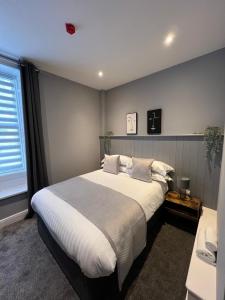 The Globe Apartments客房内的一张或多张床位