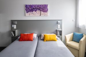 Postel nebo postele na pokoji v ubytování Smartappart Lorient