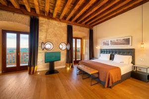 Katil atau katil-katil dalam bilik di Áurea Convento Capuchinos by Eurostars Hotel Company