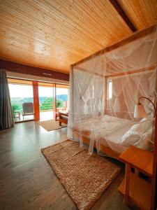Postel nebo postele na pokoji v ubytování BSR Farms Resort