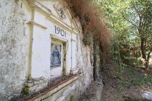 an old building with a sign on the side of it at Casa Garalp - Only Adults by SIERRA VIVA in Aracena