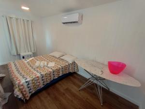 Ένα ή περισσότερα κρεβάτια σε δωμάτιο στο SUITE MIKONOS ILHA Da FANTASIA