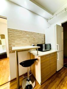 Kuchyňa alebo kuchynka v ubytovaní Cristal Apartament Krynica - Zdrój