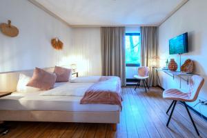 Postel nebo postele na pokoji v ubytování Hotel Waldkur