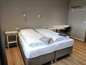 Letto o letti in una camera di Hótel Laugarvatn