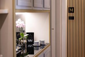 Kuchyň nebo kuchyňský kout v ubytování Mavi Luxury Suites