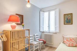 Postel nebo postele na pokoji v ubytování Apartment Renza tra le Ville Lucchesi!