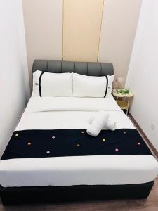 Postel nebo postele na pokoji v ubytování Agile TRX Luxury suite Bukit bintang