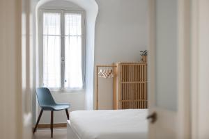 Ένα ή περισσότερα κρεβάτια σε δωμάτιο στο BordiLand 1