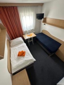 Posteľ alebo postele v izbe v ubytovaní Hotel Remy