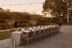 a long table set up for a wedding reception at Yarra Valley Lodge in Wonga Park
