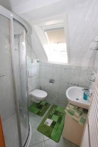 Koupelna v ubytování Ferienwohnung Inselsbergblick