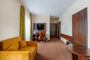 Telewizja i/lub zestaw kina domowego w obiekcie Hotel Pod Szrenicą