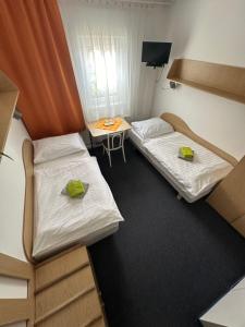 Posteľ alebo postele v izbe v ubytovaní Hotel Remy
