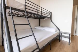 Postel nebo postele na pokoji v ubytování Joe Litty Rooms
