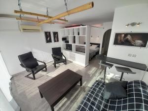 Posezení v ubytování Appartement Village Naturiste Shibari