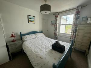 Voodi või voodid majutusasutuse Oyster Cottage toas