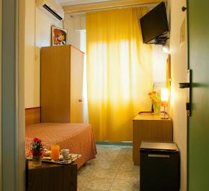 TV a/nebo společenská místnost v ubytování Hotel Dolly