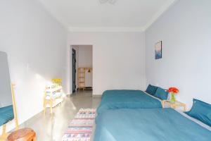 Postel nebo postele na pokoji v ubytování Kim Little Hotel Dalat