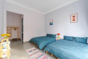 Postel nebo postele na pokoji v ubytování Kim Little Hotel Dalat