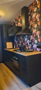 Kuchyň nebo kuchyňský kout v ubytování Casa Viva la Vida - Luxe vakantiewoning in het hart van de Bollenstreek en dichtbij Strand, Meer, Duinen en Keukenhof