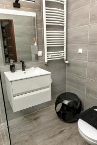 Koupelna v ubytování MarinaSpa Dziwnow