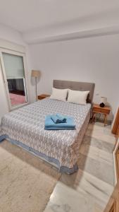 Ένα ή περισσότερα κρεβάτια σε δωμάτιο στο Calpe Playa Kas