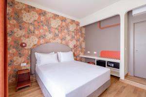 Postel nebo postele na pokoji v ubytování UNICO Suite - GRUPPO BLAM