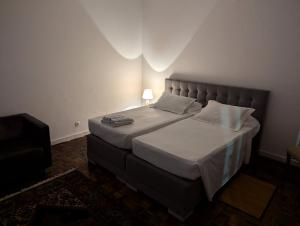 Postel nebo postele na pokoji v ubytování Casa Estrela - Sea & Art Guesthouse