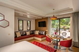 TV a/nebo společenská místnost v ubytování Barceló Palmeraie Oasis Resort