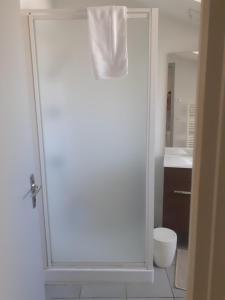 Et badeværelse på Appartement climatisé