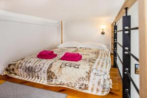 Posteľ alebo postele v izbe v ubytovaní Apartments on Miodowa
