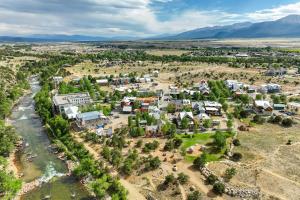 an aerial view of a small town next to a river at Whitewater Estate House & Guesthouse w Hot Tub in Buena Vista
