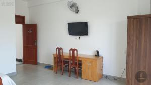 TV a/nebo společenská místnost v ubytování Vy An Hotel