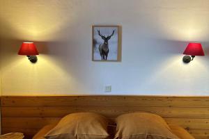 Cama o camas de una habitación en Les chalets d'Arrens